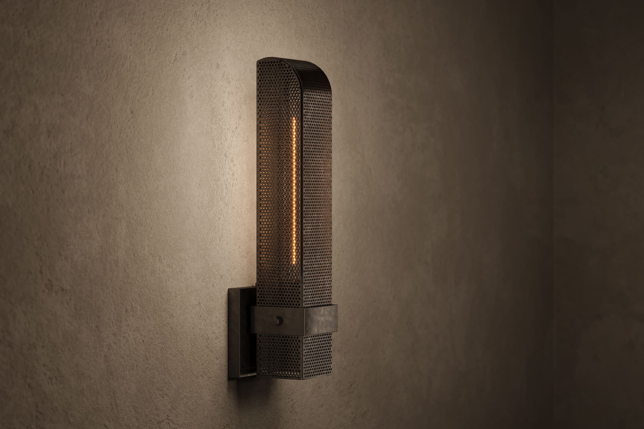 Modern architectural lighting featuring the Baffle Sconce, a wall sconce in hand-finished perforated metal.