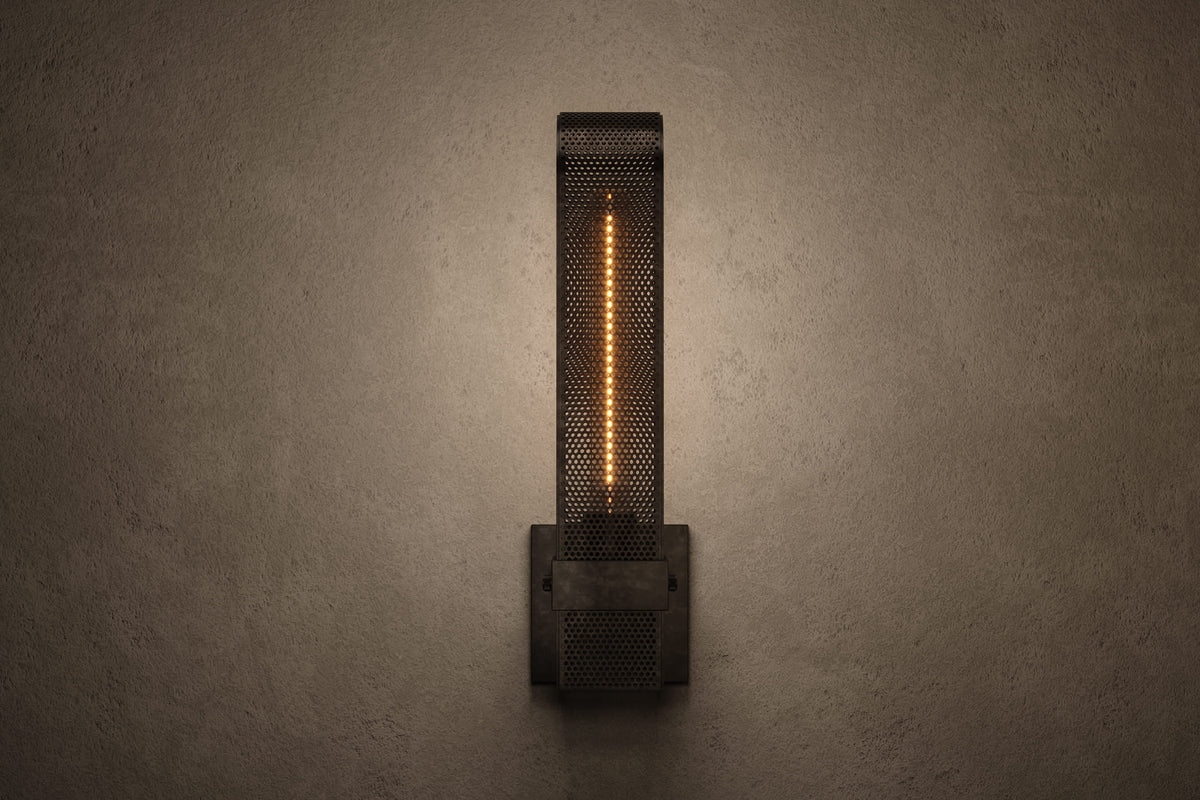 Front view of the architectural designer Baffle Sconce, an industrial-inspired wall light featuring hand-finished perforated steel for genuine, utilitarian elegance.