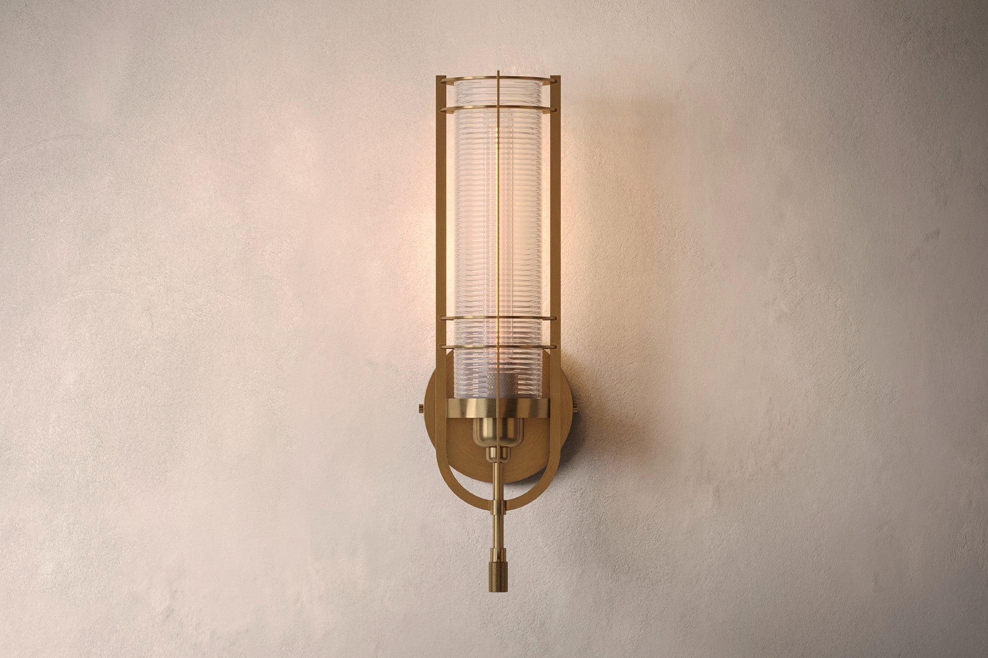 Designer lighting featuring the Batten Sconce, a modern wall sconce in hand-finished solid brass and ribbed glass.
