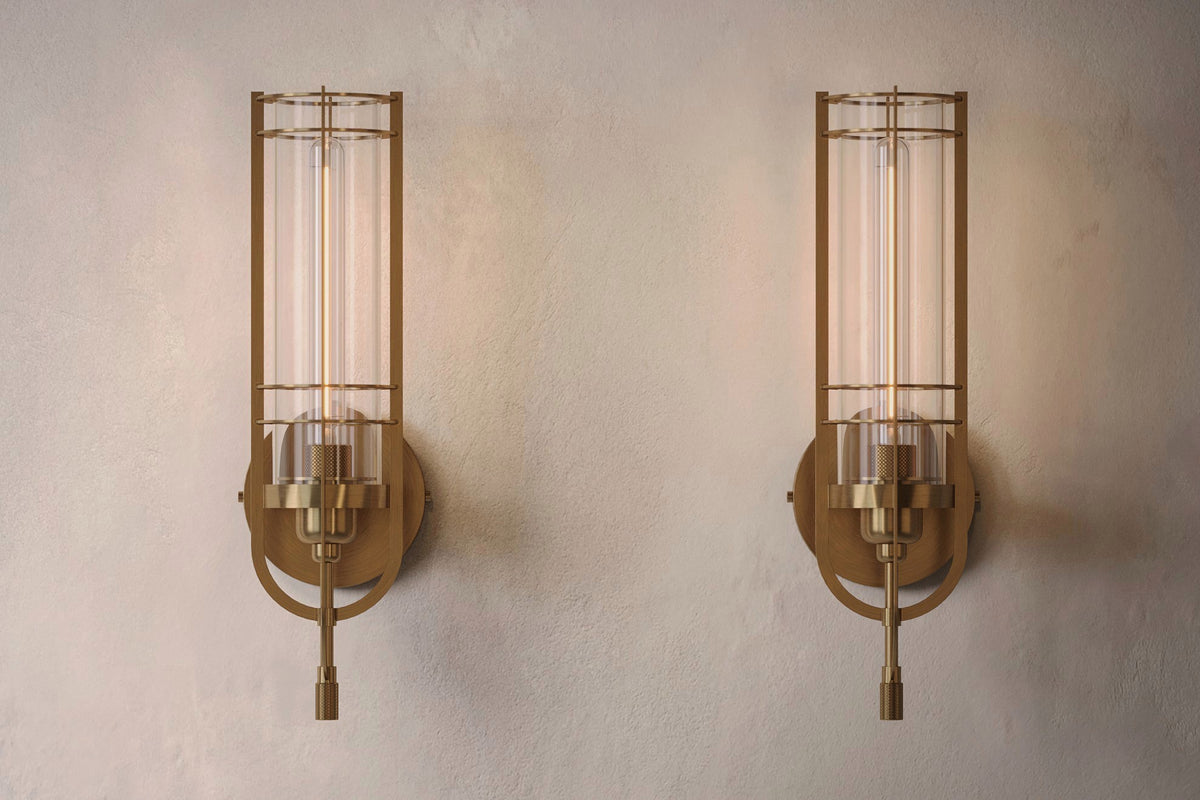 Front view of pair of designer Batten Sconces, nautically-inspired wall lights featuring hand-finished solid brass and heavy glass for authentic, artisanal elegance.