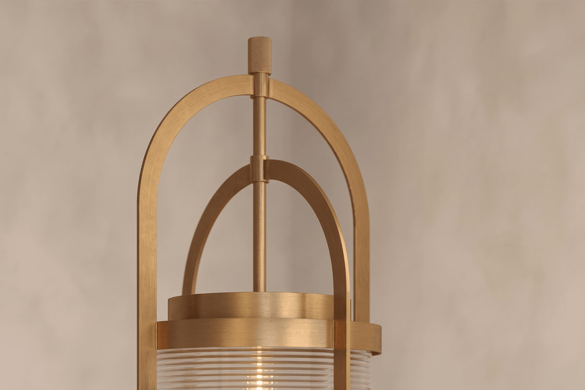 Close-Up view of the architectural designer Binnacle Post Lamp, a nautically-inspired outdoor light featuring hand-finished solid brass and heavy glass for authentic, artisanal elegance.