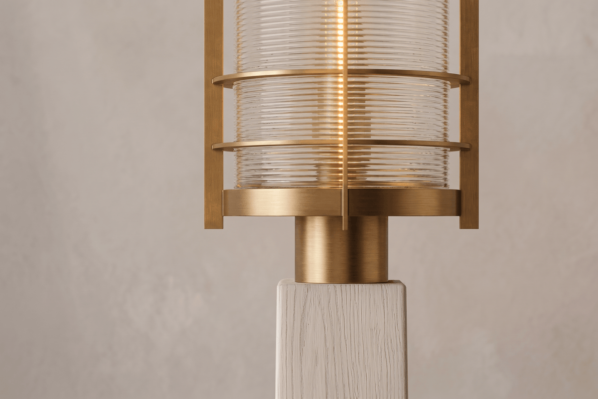 Close-Up view of the designer Binnacle Post Lamp, a nautically-inspired outdoor light featuring hand-finished solid brass and heavy glass for authentic, artisanal elegance.