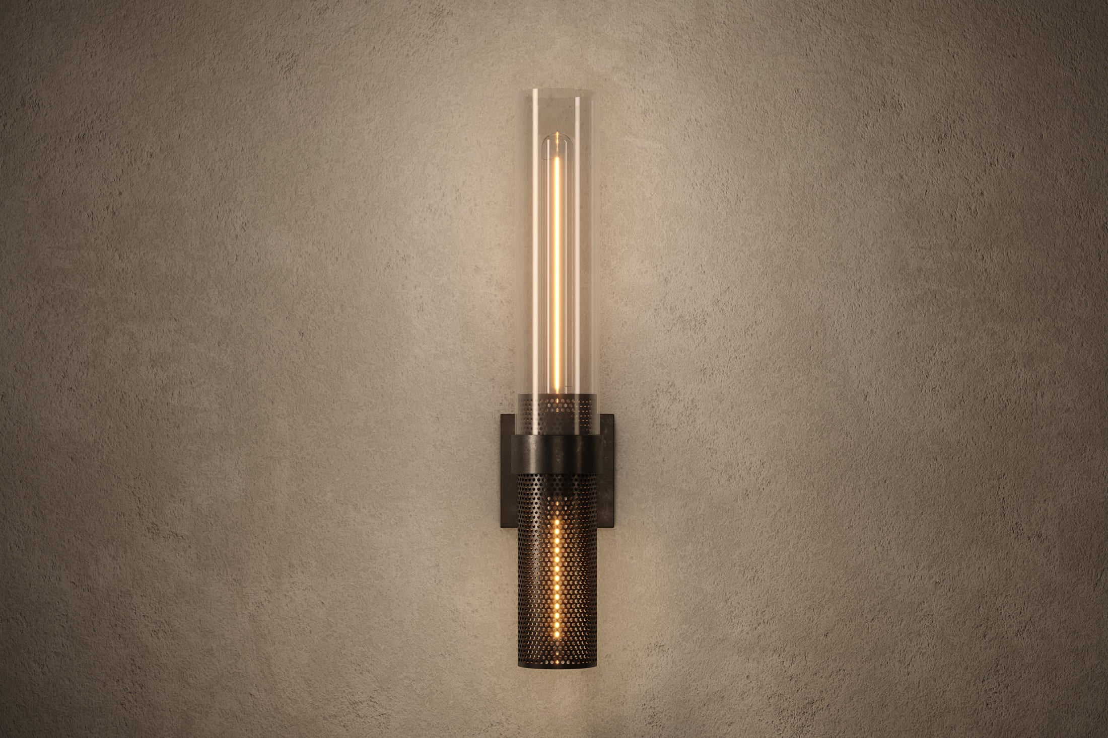 Modern designer lighting featuring the Carbide Sconce, a wall sconce in hand-finished perforated metal and glass.
