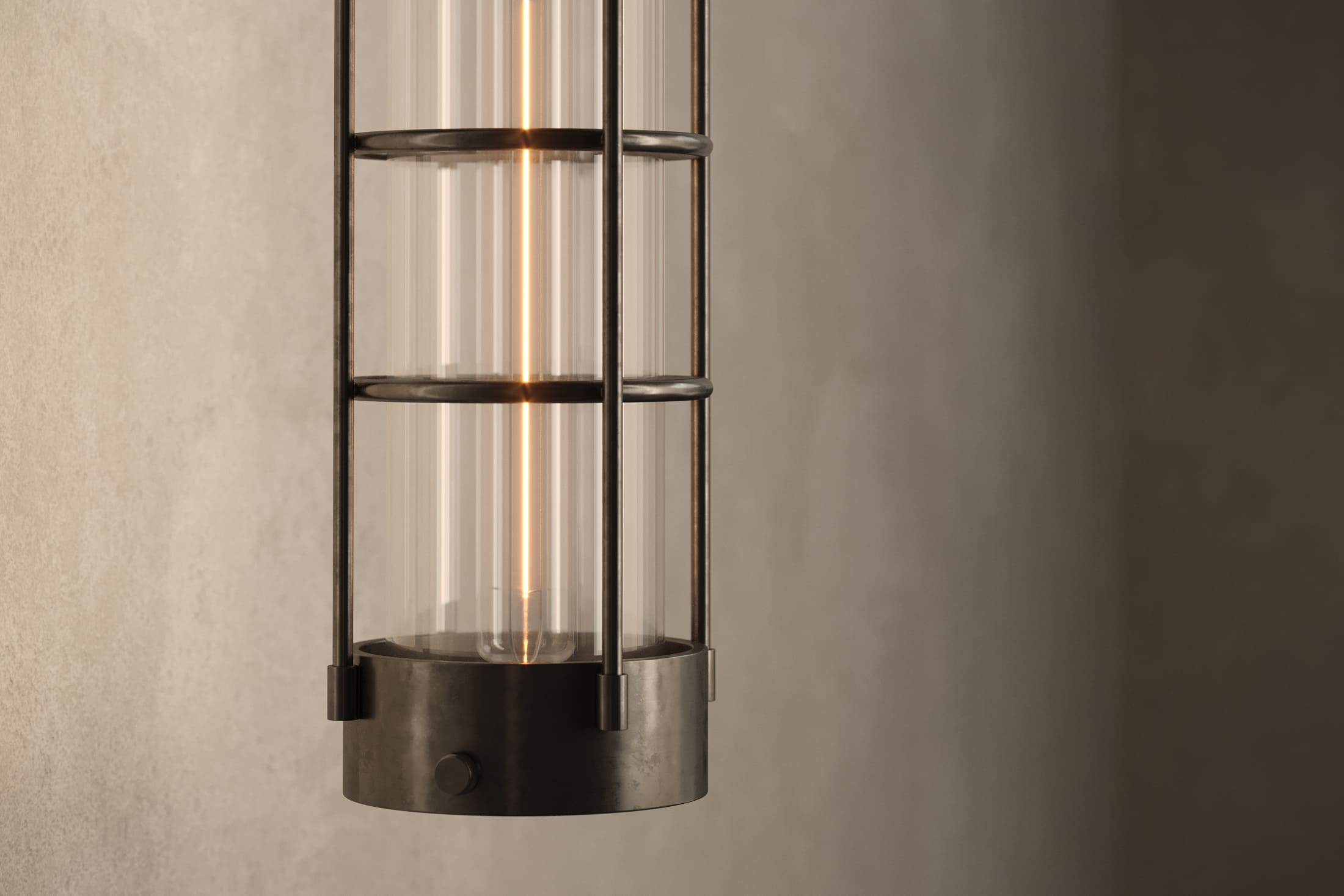 Close-up of the Davy Sconce, a modern wall sconce featuring hand-finished steel and glass.