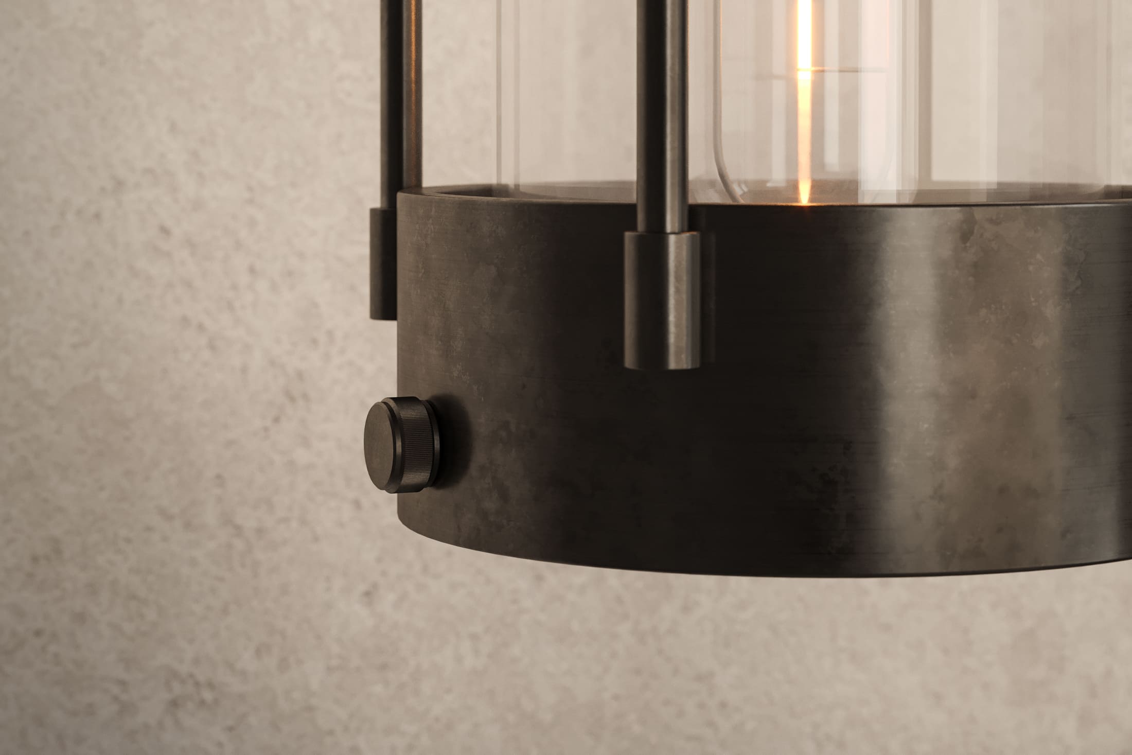 Close-up of the Davy Sconce, a modern wall sconce featuring hand-finished steel and glass.