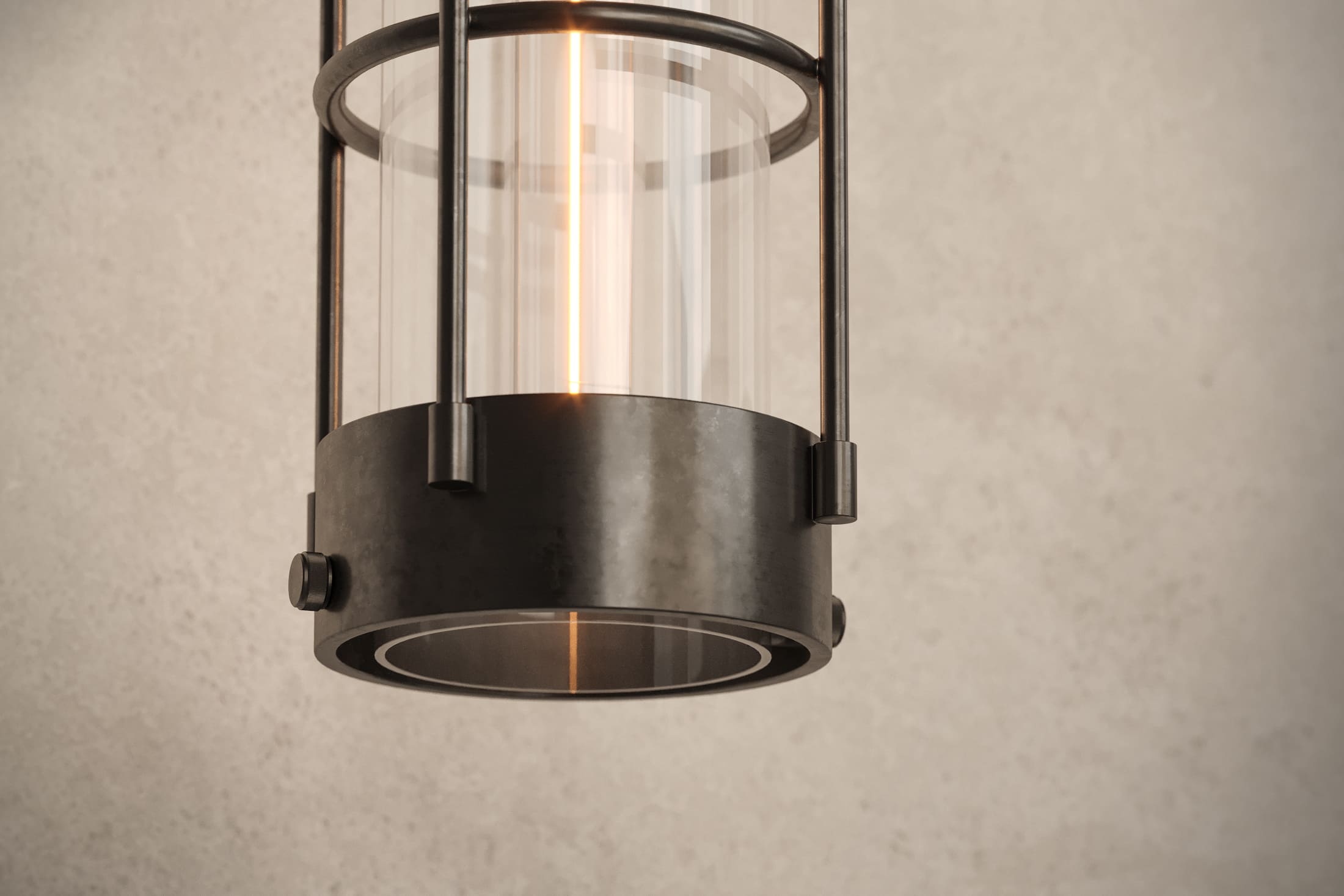 Close-up of the Davy Sconce, a modern wall sconce featuring hand-finished steel and glass.