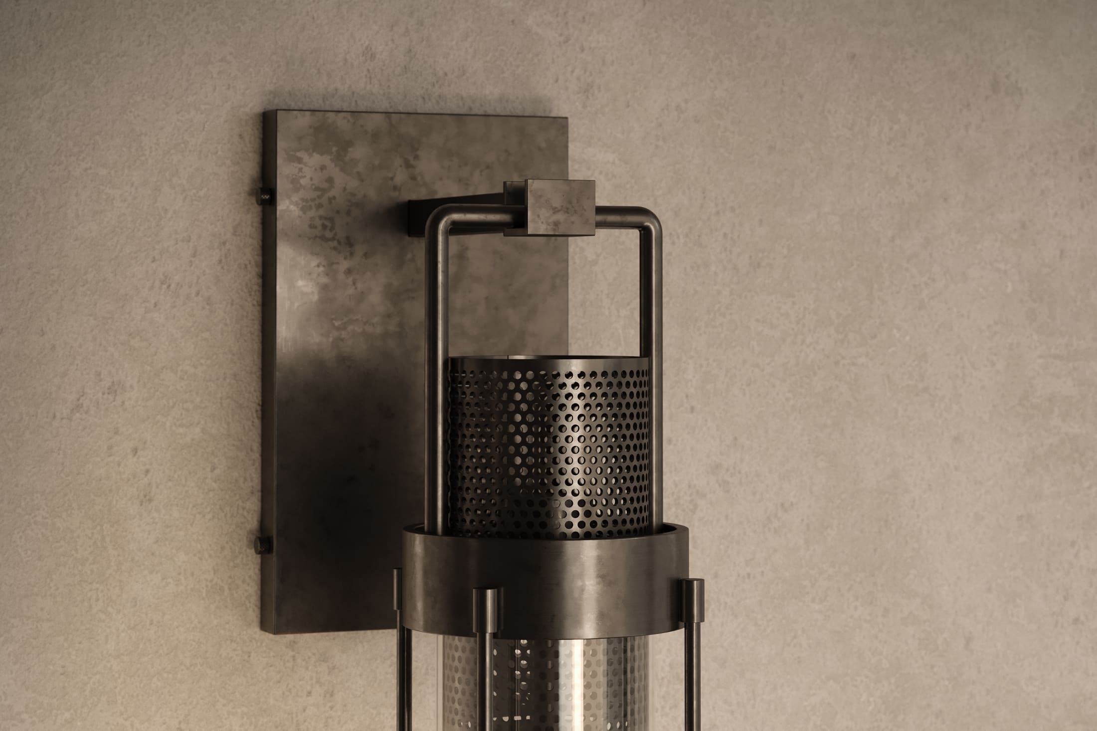 Close-up of the Davy Sconce, a modern wall sconce featuring hand-finished steel and glass.
