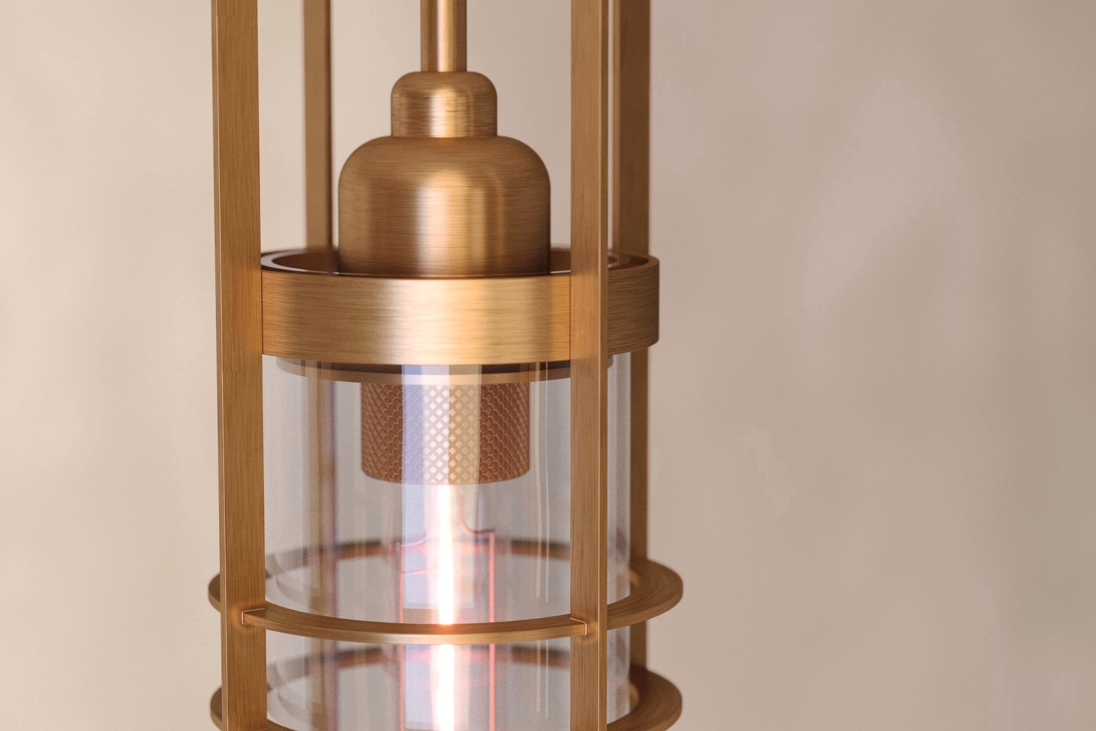 Close-up of the Halyard Pendant, a modern pendant light featuring hand-finished solid brass and glass.