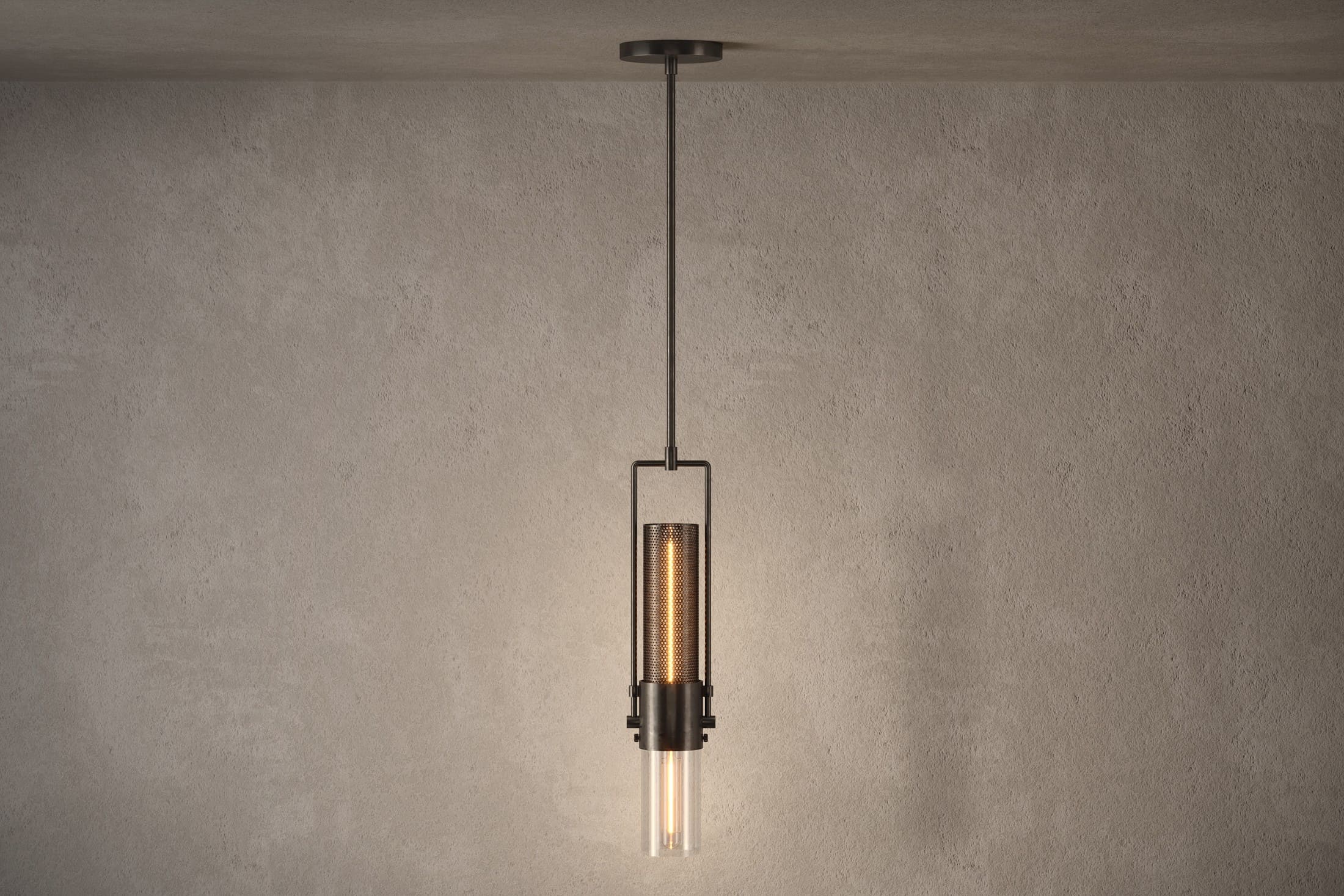 Designer lighting featuring the Plumb Pendant, a modern pendant light in hand-finished steel and glass.