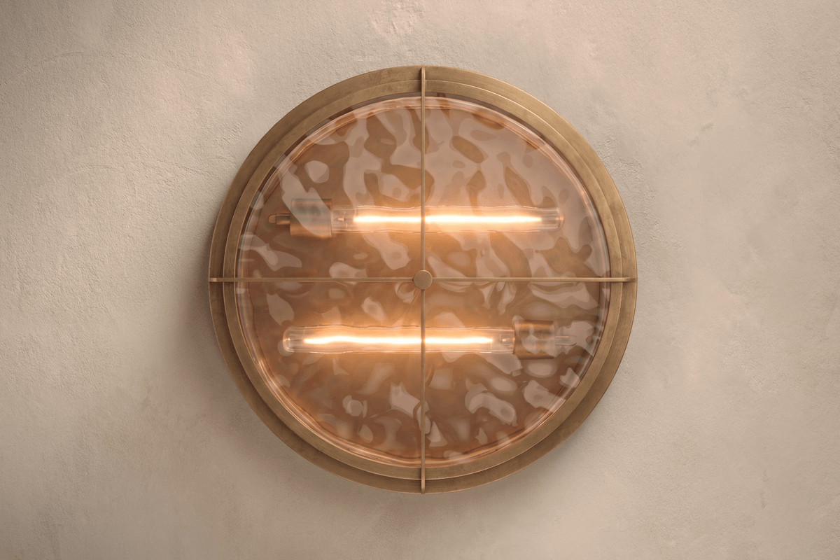 Bottom view of the designer Zenith Flush Mount, a nautically-inspired ceiling light featuring hand-finished solid brass and heavy glass for authentic, artisanal elegance.
